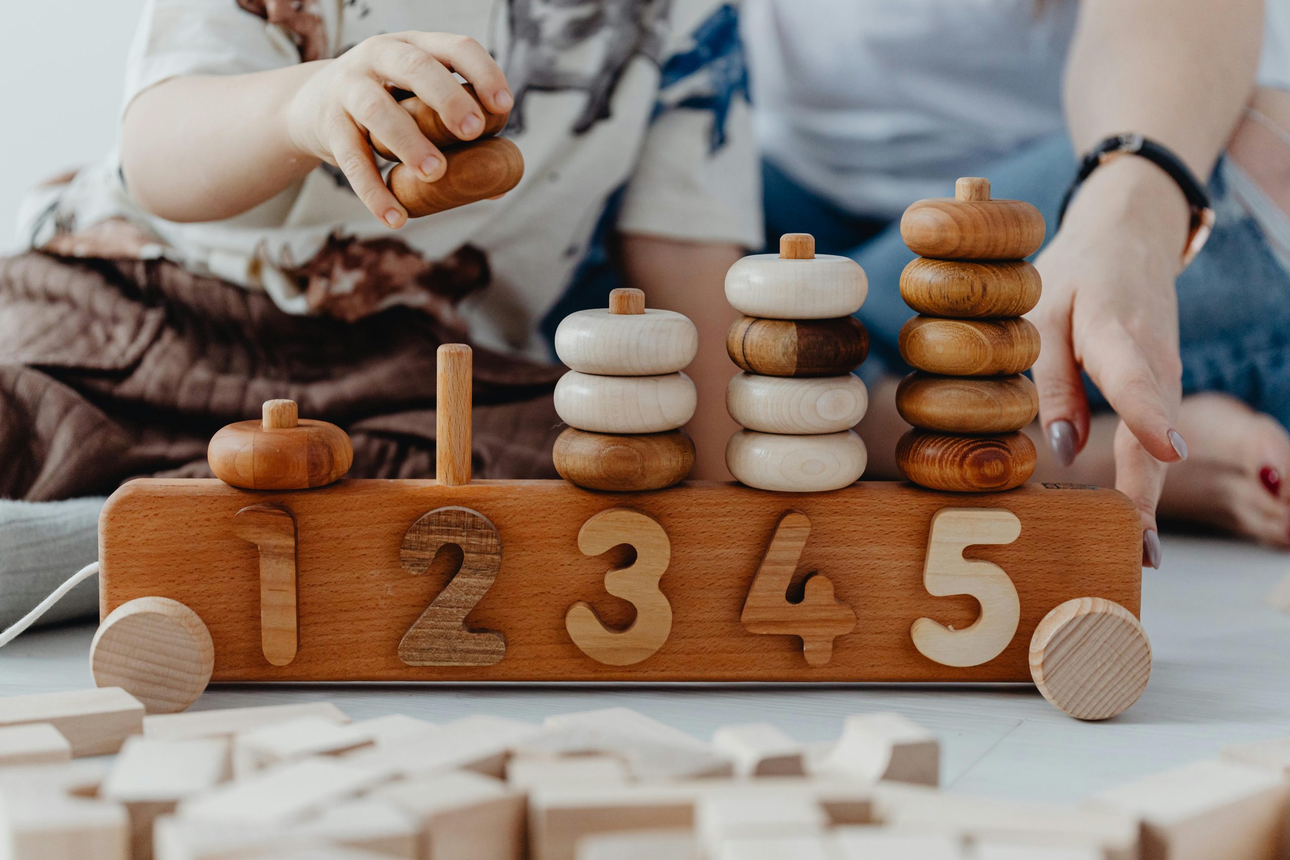 Child playing with blocks in Montessori school