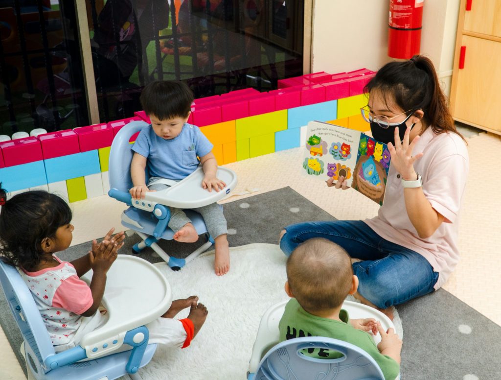 Importance of Montessori Education - teacher teaching montessori kids